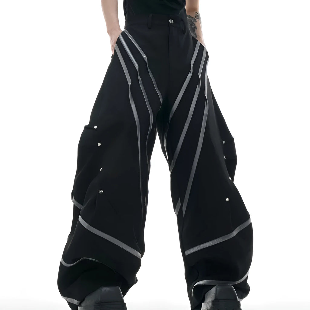 Men's trousers with metal striped rivets and pleated front in polyester fabric