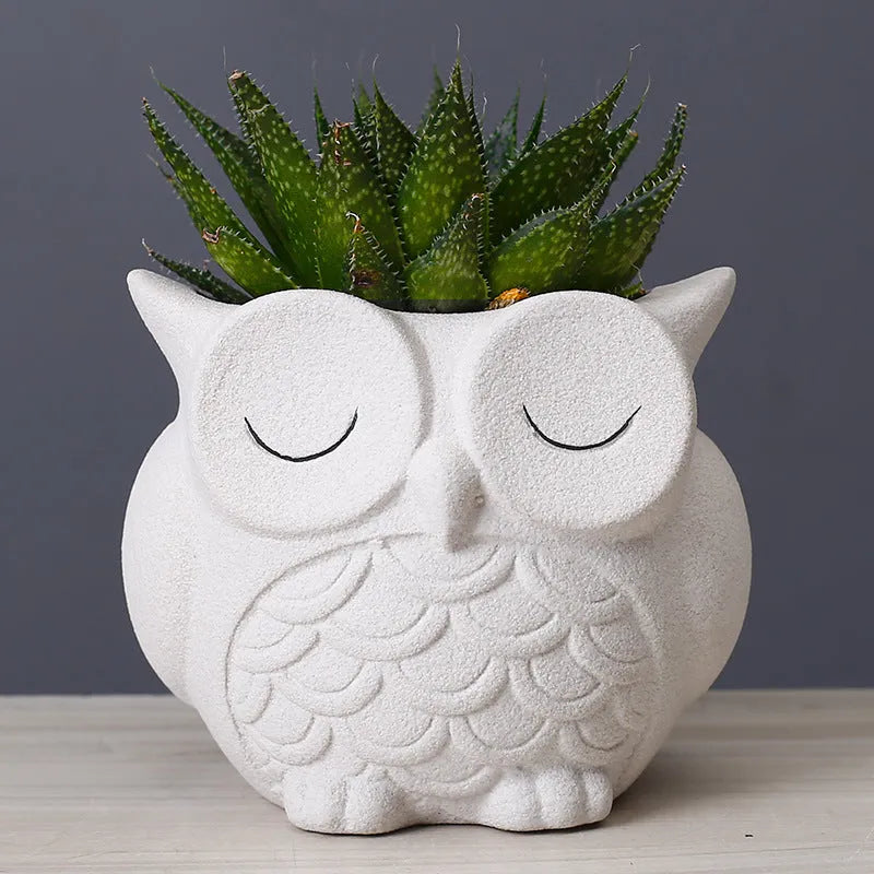 Handmade frosted ceramic flower pot with a cartoon owl design for small succulents.
