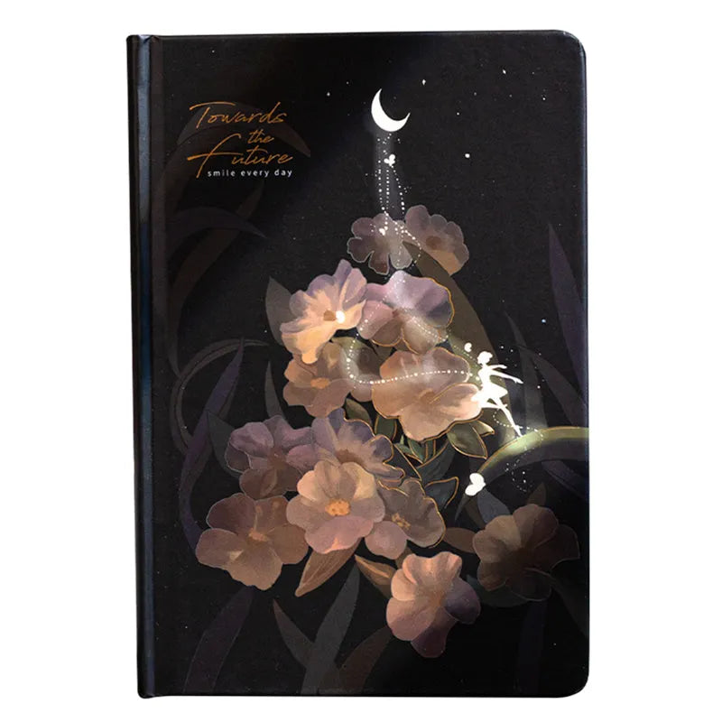 A5 scrapbook notebook with luminous cover open to show colour illustration pages, in purple colour option.