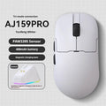 Small white gaming mouse with three connectivity options shown on gaming desk