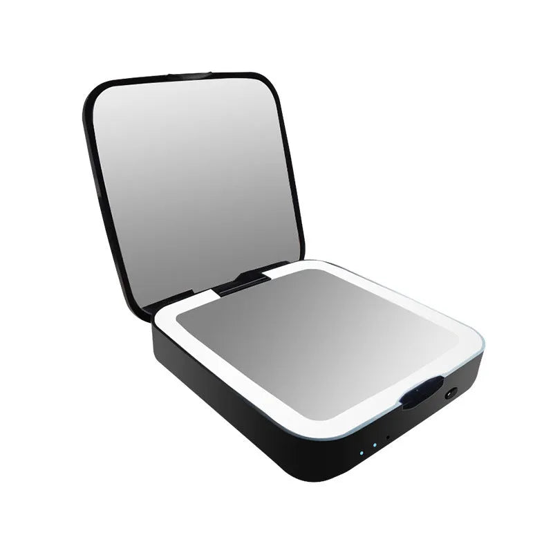 Black and white lighted makeup mirror with 4x magnification lens and adjustable LED lighting