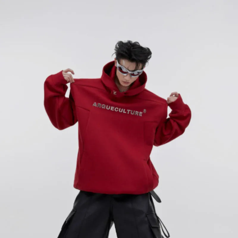 Men's black hooded sweater with metal 3D printing design and structured shoulder pads.