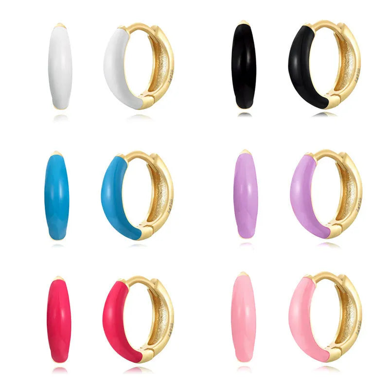 Curved oval epoxy earrings with colourful drip finish in geometric U-shape design