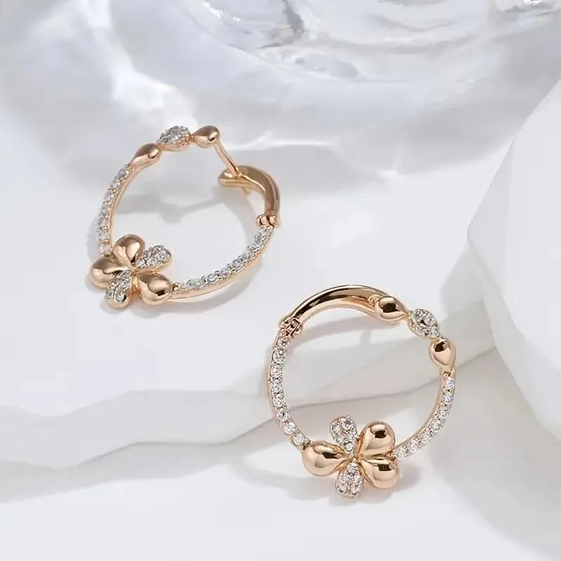 A pair of round geometric ring earrings for women with a copper base and electroplated finish.