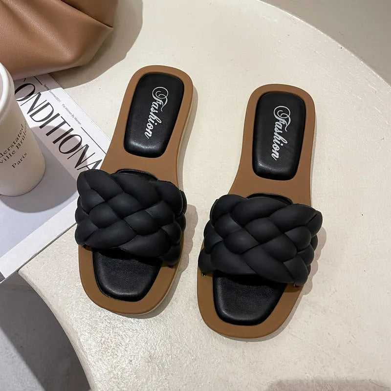 Women's plaid PVC beach sandals with thick anti-skid soles in black, green, orange and white.