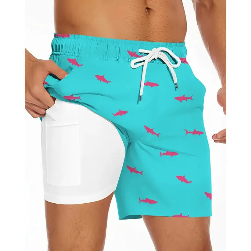 Man wearing loose light blue polyester beach pants with elastic waistband on a summer day.
