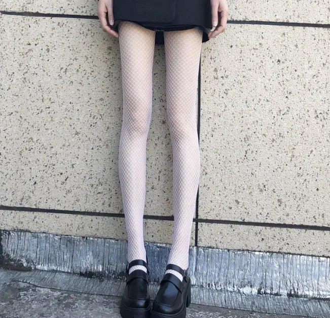 Sheer mesh pantyhose for women showing large, medium and small net patterns in black and white
