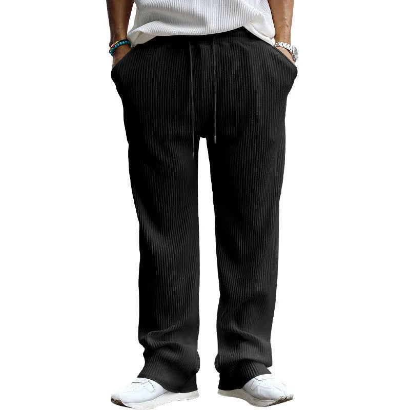 Men's straight-leg casual trousers in Army Green colour, showing high waist and loose fit.
