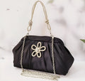 Women's soft polyester crossbody messenger bag in shell shape with chain detail and document compartment