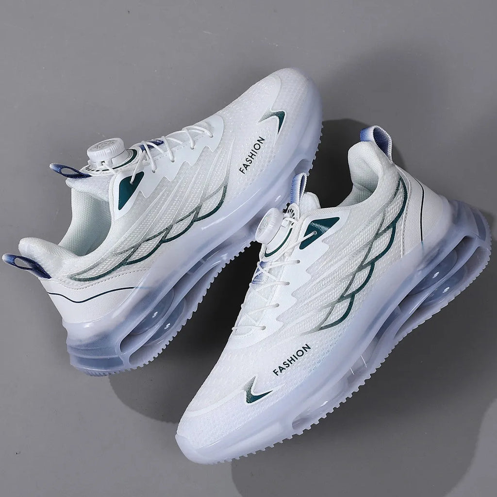 Men's white low-top casual sneakers with mesh upper, rotating button, and rubber sole.