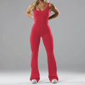 Women's black yoga bodysuit with seamless construction and mid waist design