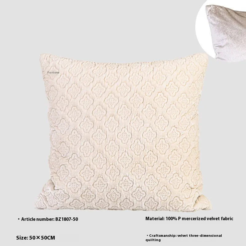 Brown gold antique Chinese style quilted cushion pillow on a sofa
