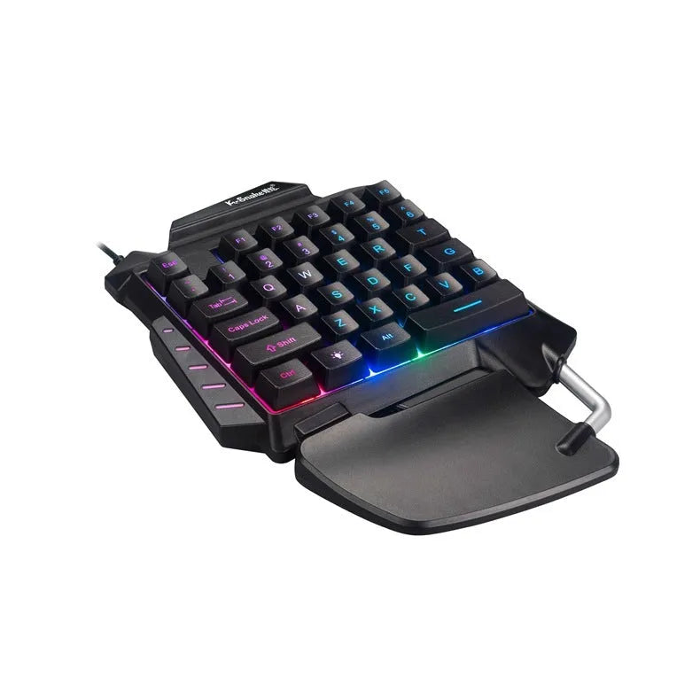 Black left-handed one-handed gaming keyboard with Throne converter and integrated hand rest for desktop PUBG gameplay