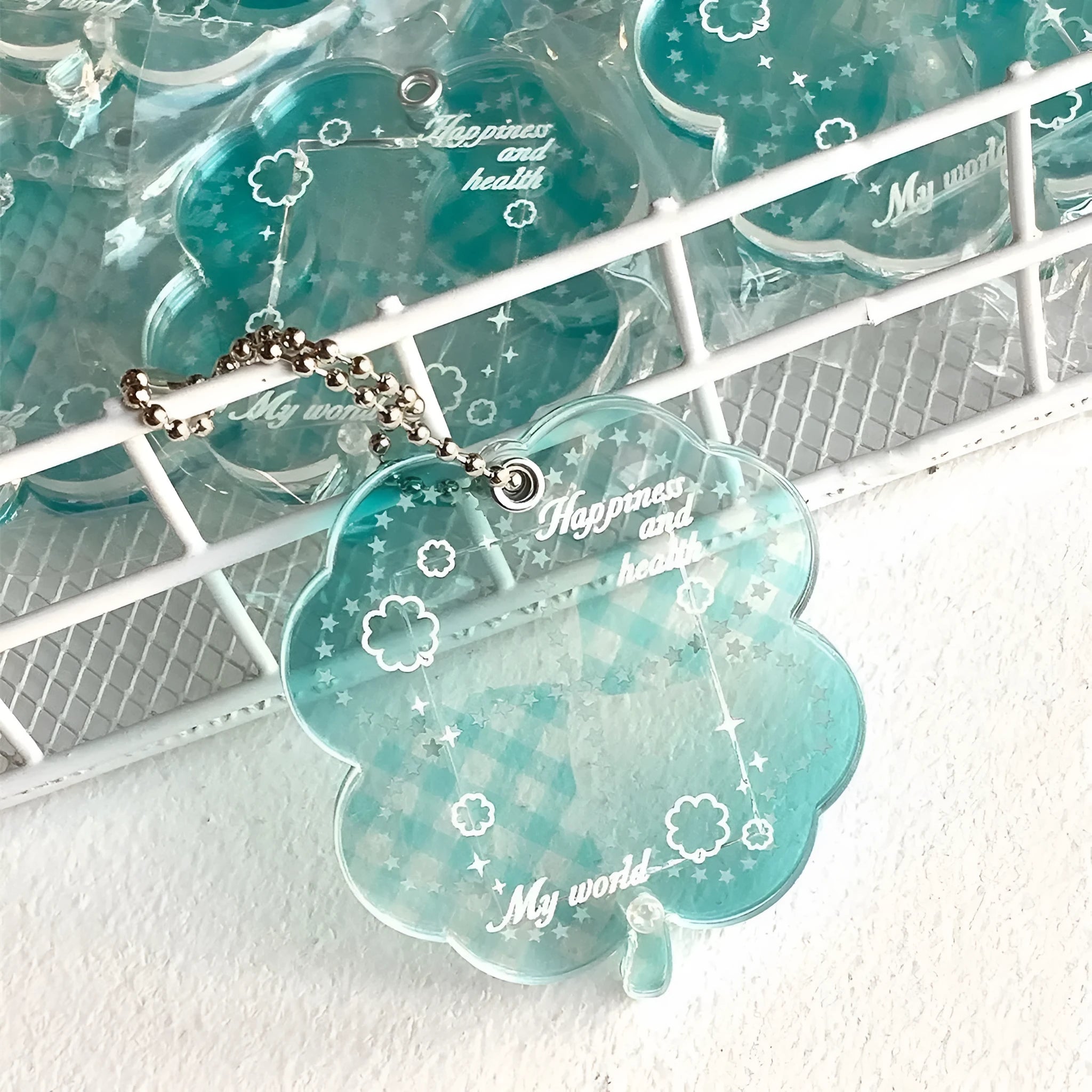Acrylic four-leaf clover phone pendant keychain in blue and green colours