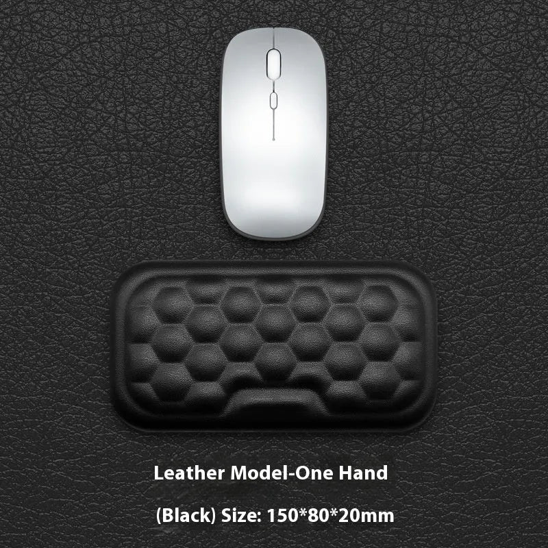 Grey and black memory foam mouse wrist pads with silicone bases, shown in cloth and leather cover options.