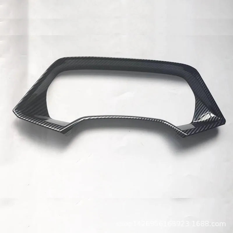 BMW X5 dashboard decorative frame in carbon fibre or peach wood finish with adhesive backing