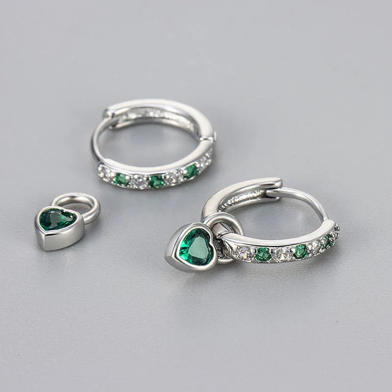 Women's zircon earrings with heart-shaped drops in gold or white gold settings with coloured gemstones