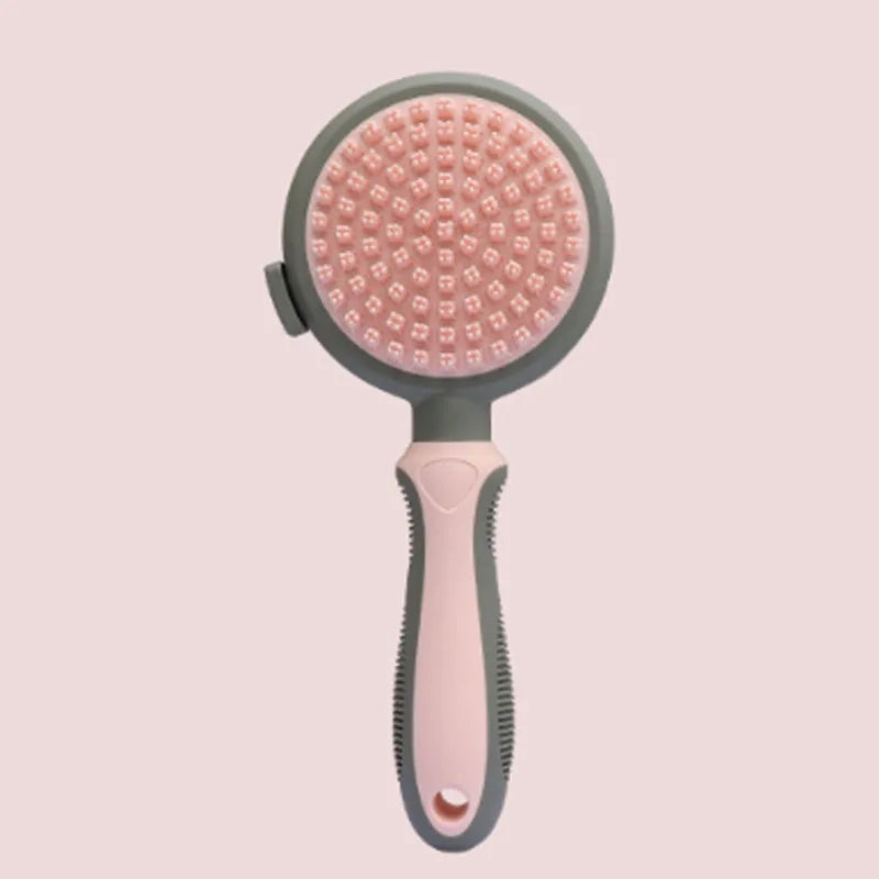 Green and pink dual-sided pet grooming brush showing slicker brush and silicone massager sides.