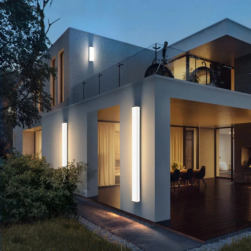 Outdoor wall light with stainless steel and PC construction measuring 60cm high with 125mm wall projection