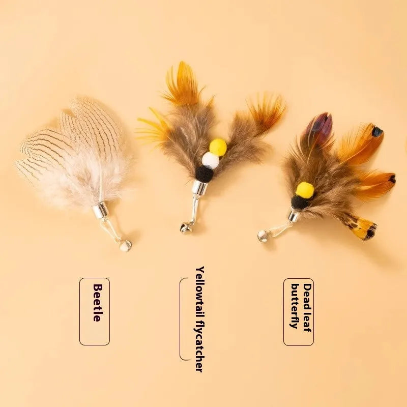 Three steel wire cat toy replacement heads with small flying insect designs in different colours.