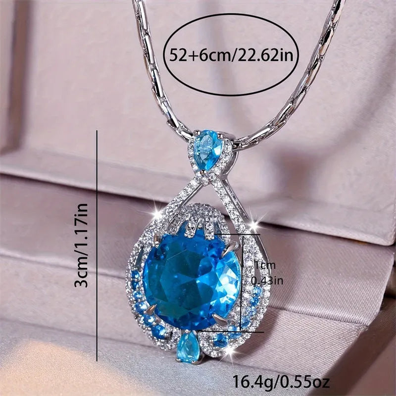 Geometric women's necklace with blue crystal fireworks cut pendant on water wave chain