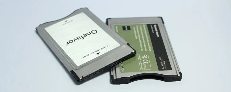 SD to PCMCIA adapter card with stainless steel housing for Mercedes-Benz vehicles, includes 32GB SD card.