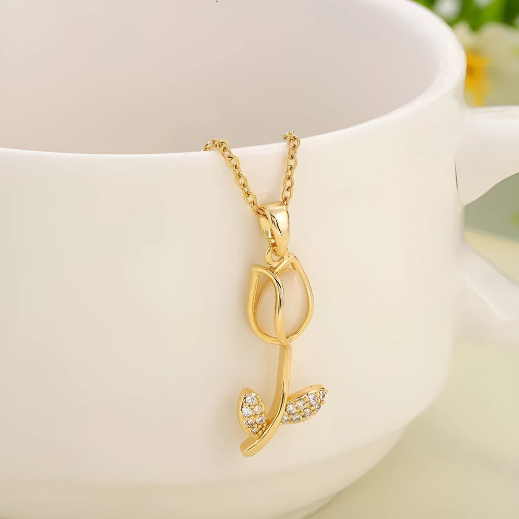 Gold-coloured zircon tulip pendant necklace on an adjustable O-ring chain, shown in pink, yellow, purple, green, and white colour variations.