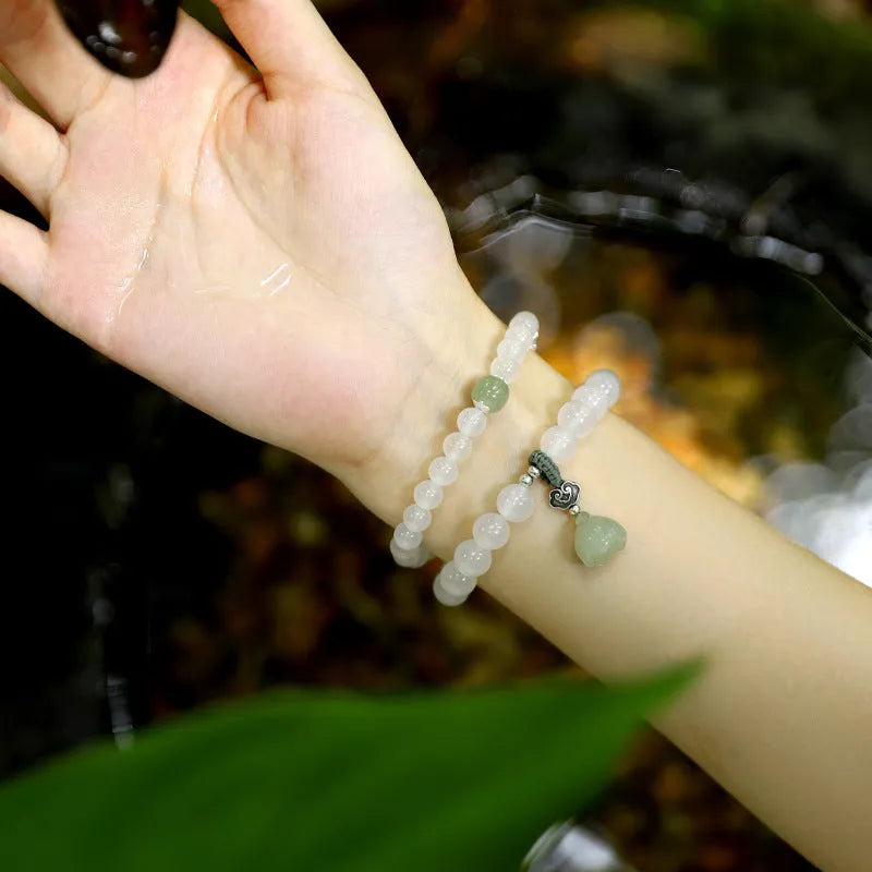 Original design women's bracelet in S925 sterling silver with white agate and Hetian jade geometric lotus pattern