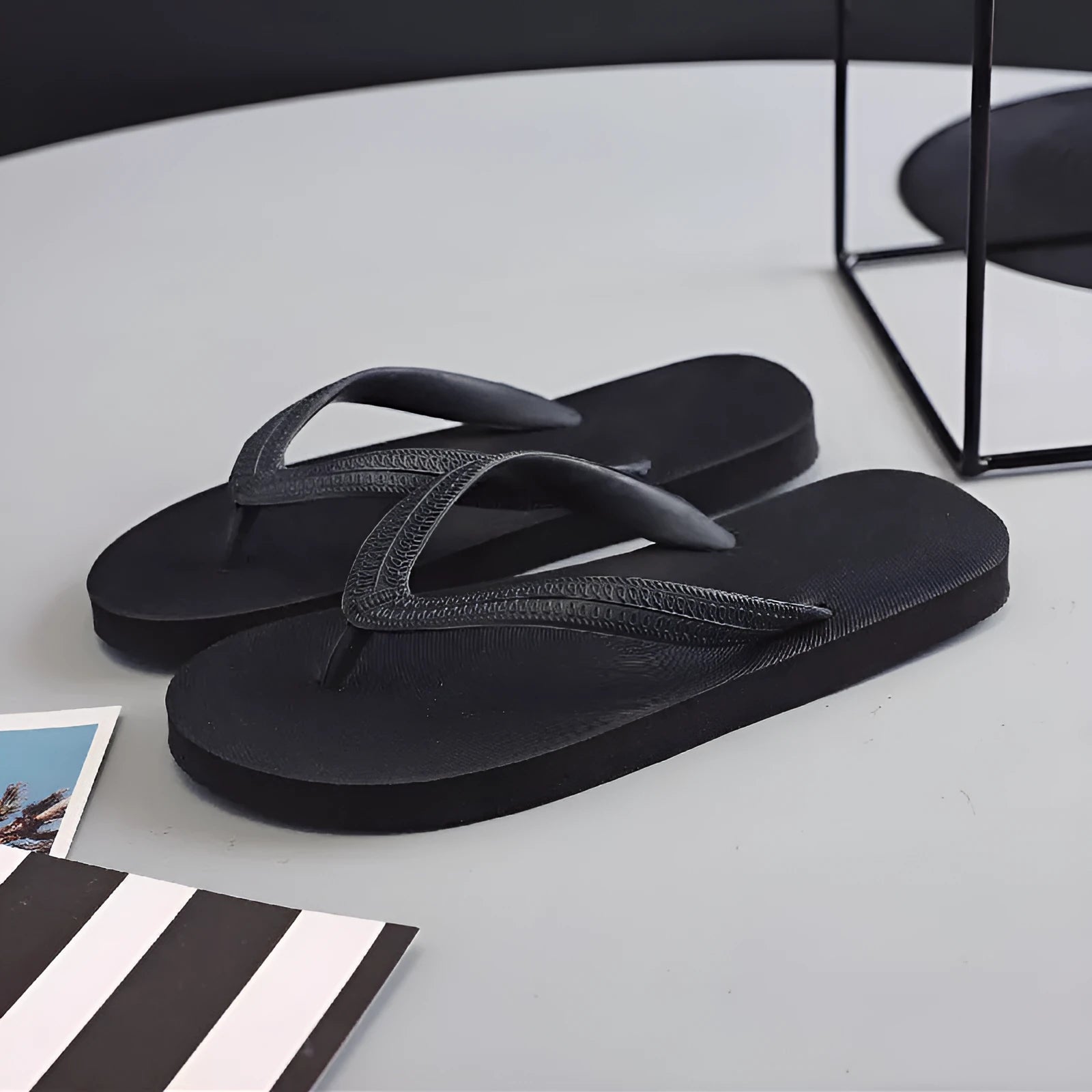 Casual rubber flip-flops available in four colours with fish label detailing