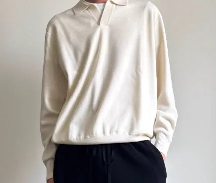 Pure wool polo sweater with a lapel collar in loose fit, shown in Navy Blue.