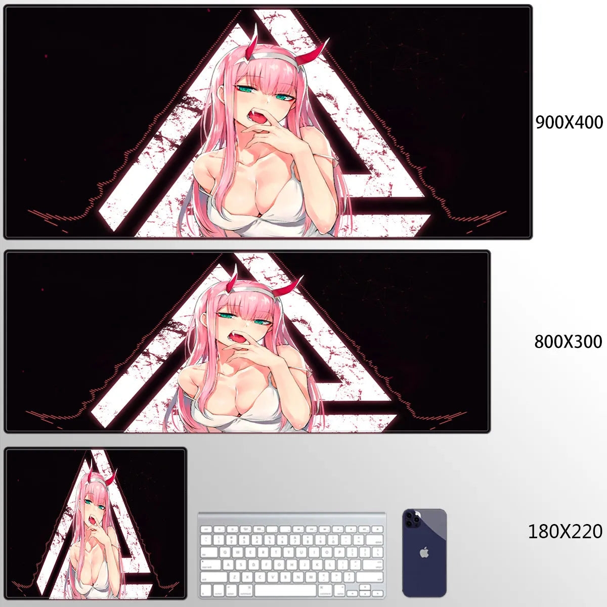 Pink cloth keyboard mat with Darling in the Franxx anime print on a desk