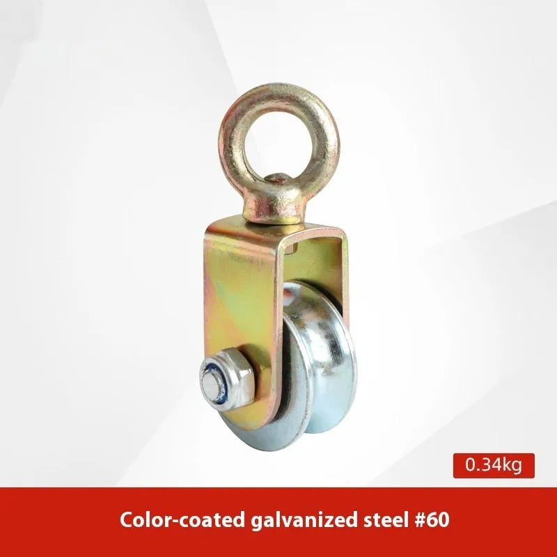 Red industrial steel lifting pulley with a safety latch on the hook.