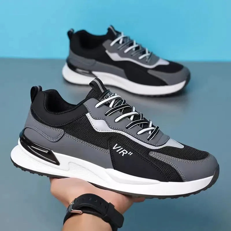 Men's colour block mesh sneakers in black, grey, or white on a plain background