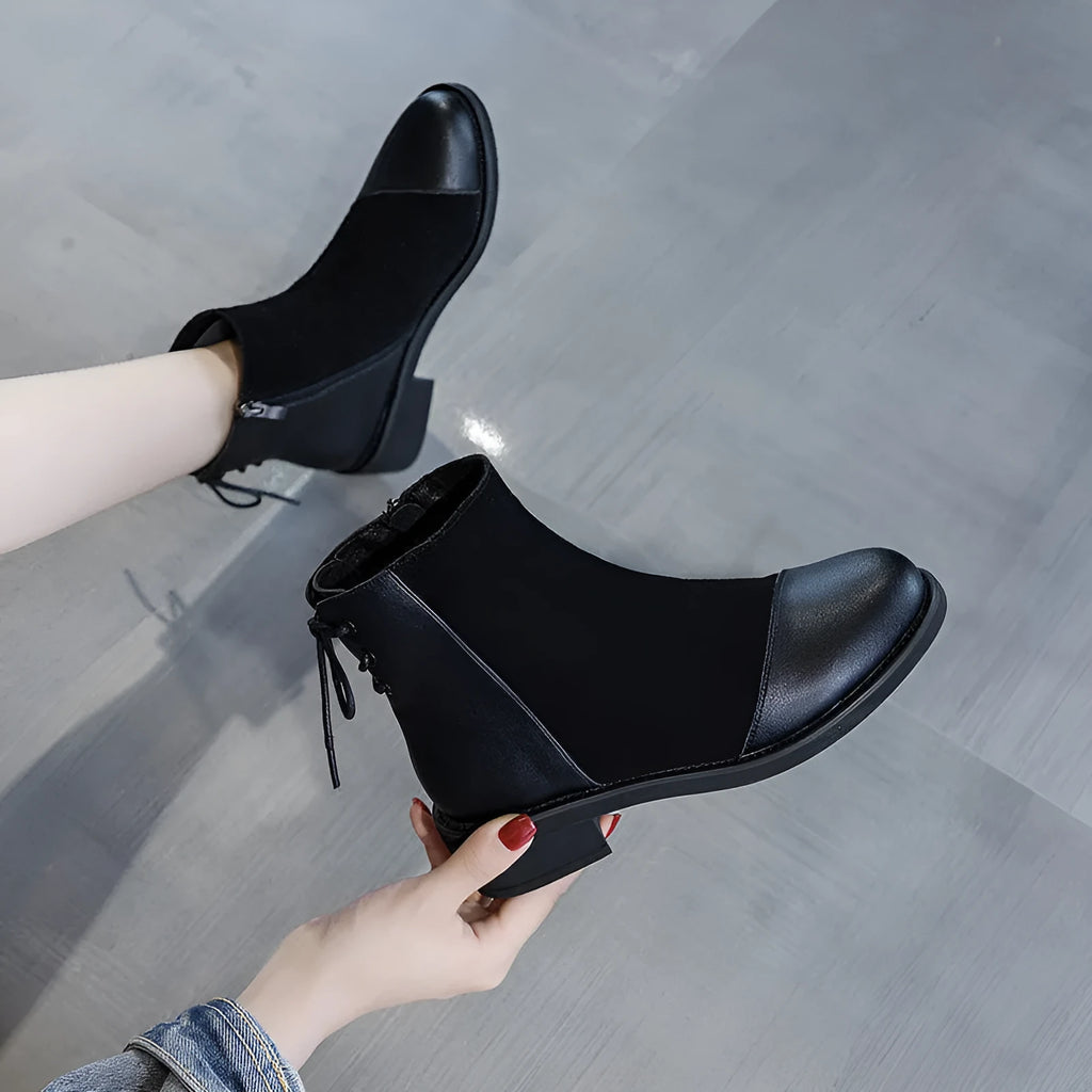 Black women's knee-high Martin boots with side zip and bow detail