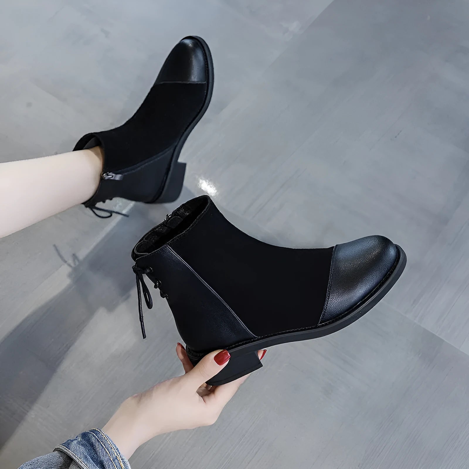 Black women's knee-high Martin boots with side zip and bow detail