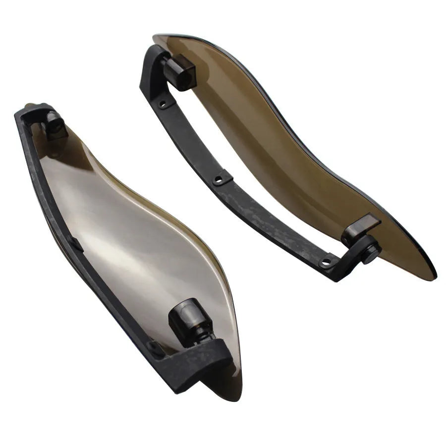 Black smoked ABS windshield side wing for a Harley Davidson three-wheel Glide motorcycle.