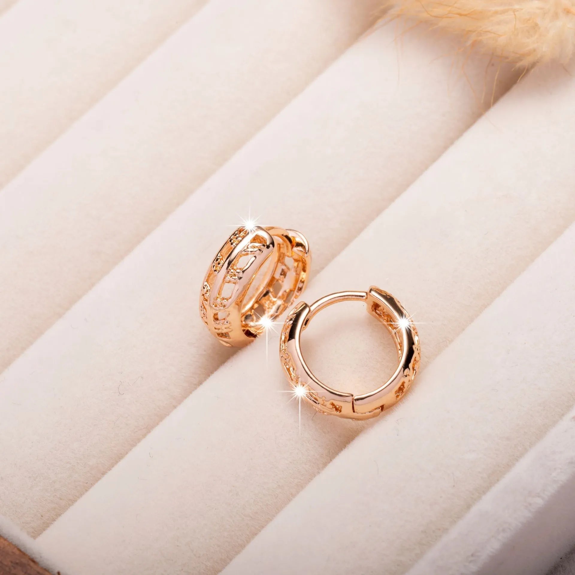 Rose gold tone hollowed out copper earrings with combined heart and leaf shapes