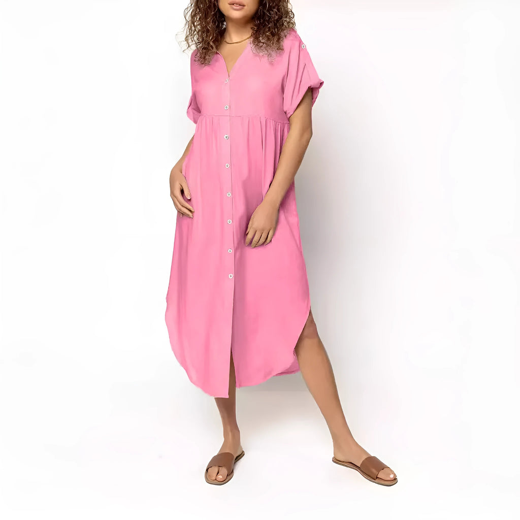 Loose-fitting casual solid colour button dress in a mid-length style on a hanger.