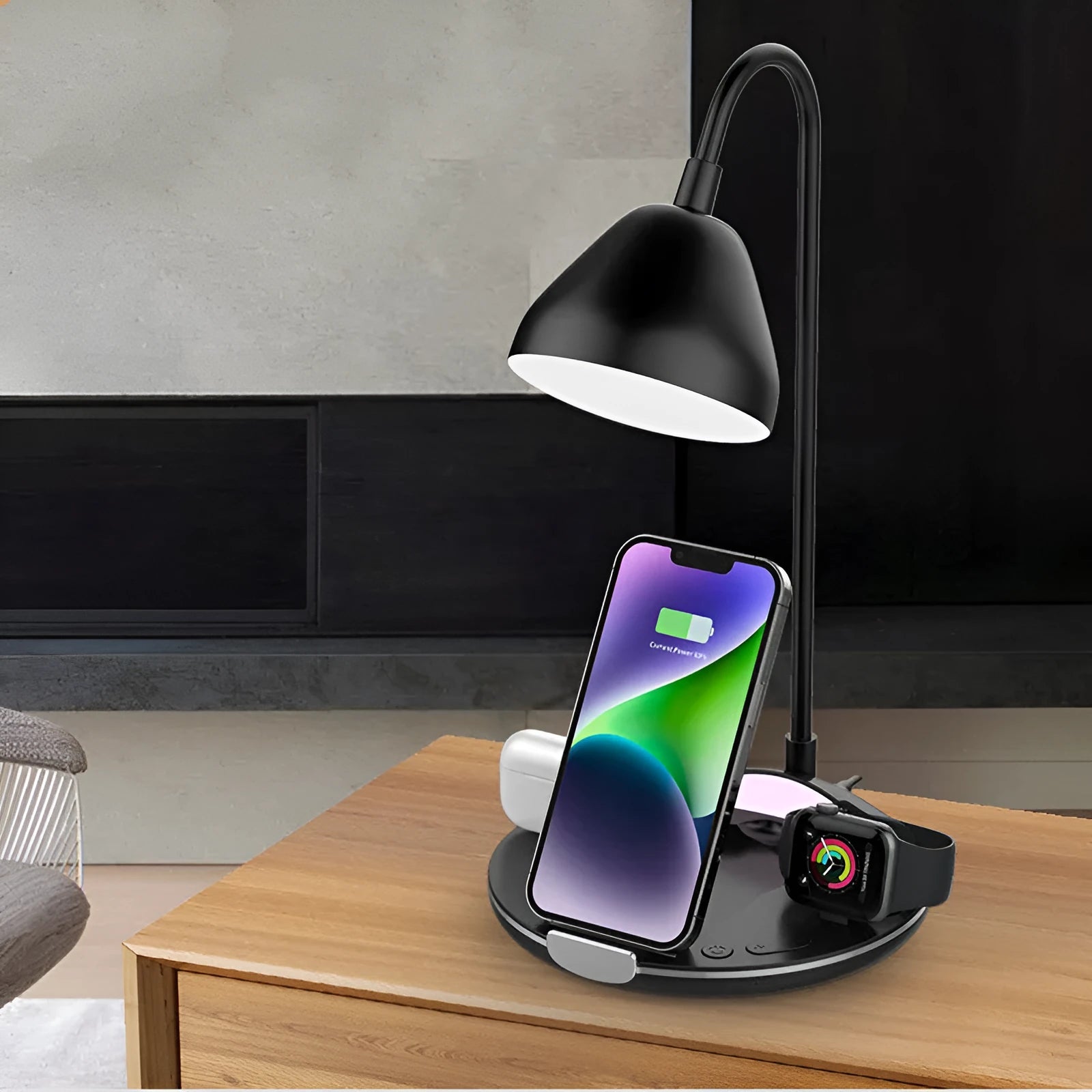 Black magnetic folding wireless charger unfolded showing phone, earbuds, and watch on charging pads