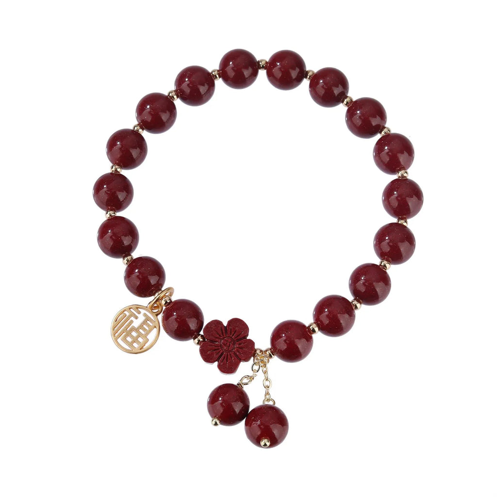 Women's cinnabar national style bracelet with purple gold sand finish and Fu character peach blossom charm