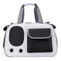 Foldable canvas pet carrier bag with shoulder strap shown in three colour options.