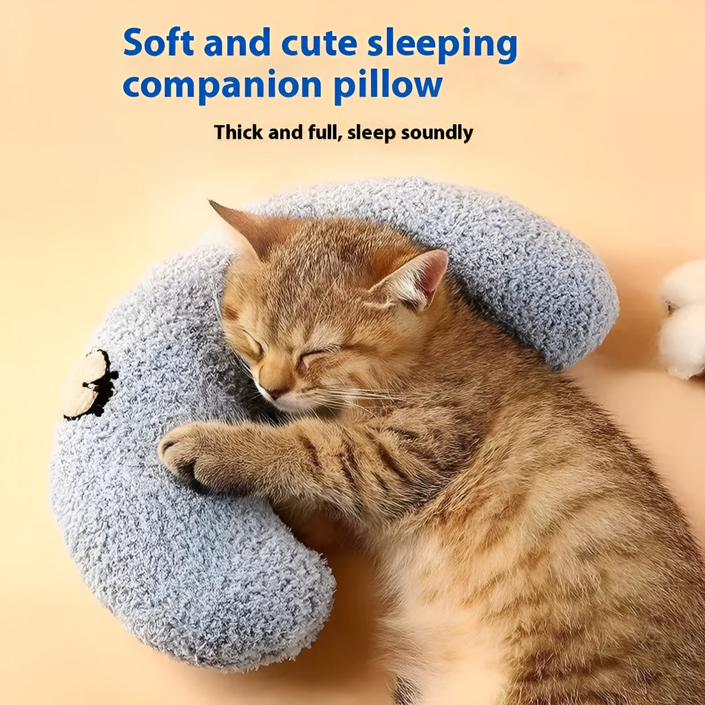 Blue U-shaped pet pillow for cat neck support with moon design on cloth material