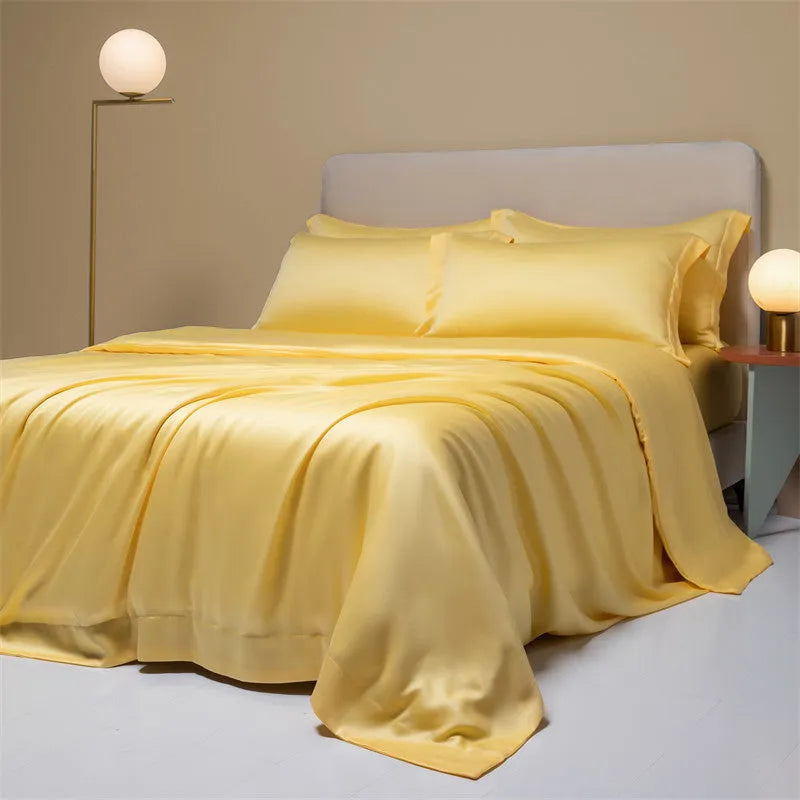 Luxury Tencel Lyocell bedding set with quilt cover, sheet, and pillowcases in grey.