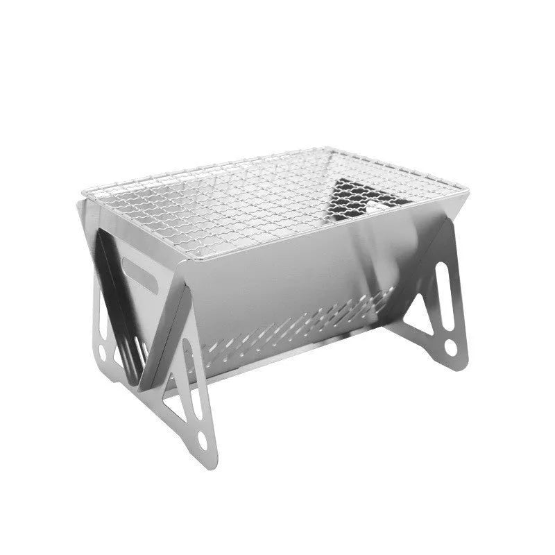 Large stainless steel folding barbecue oven with storage bag for outdoor use.