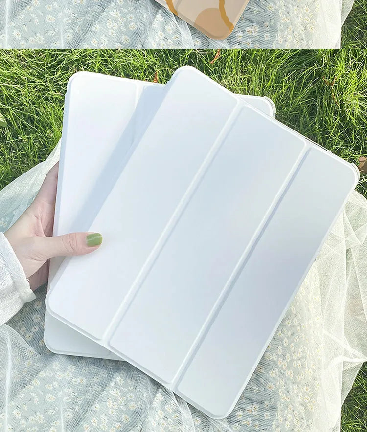A flat, tri-fold silicone iPad protective case featuring a cartoon rabbit design.
