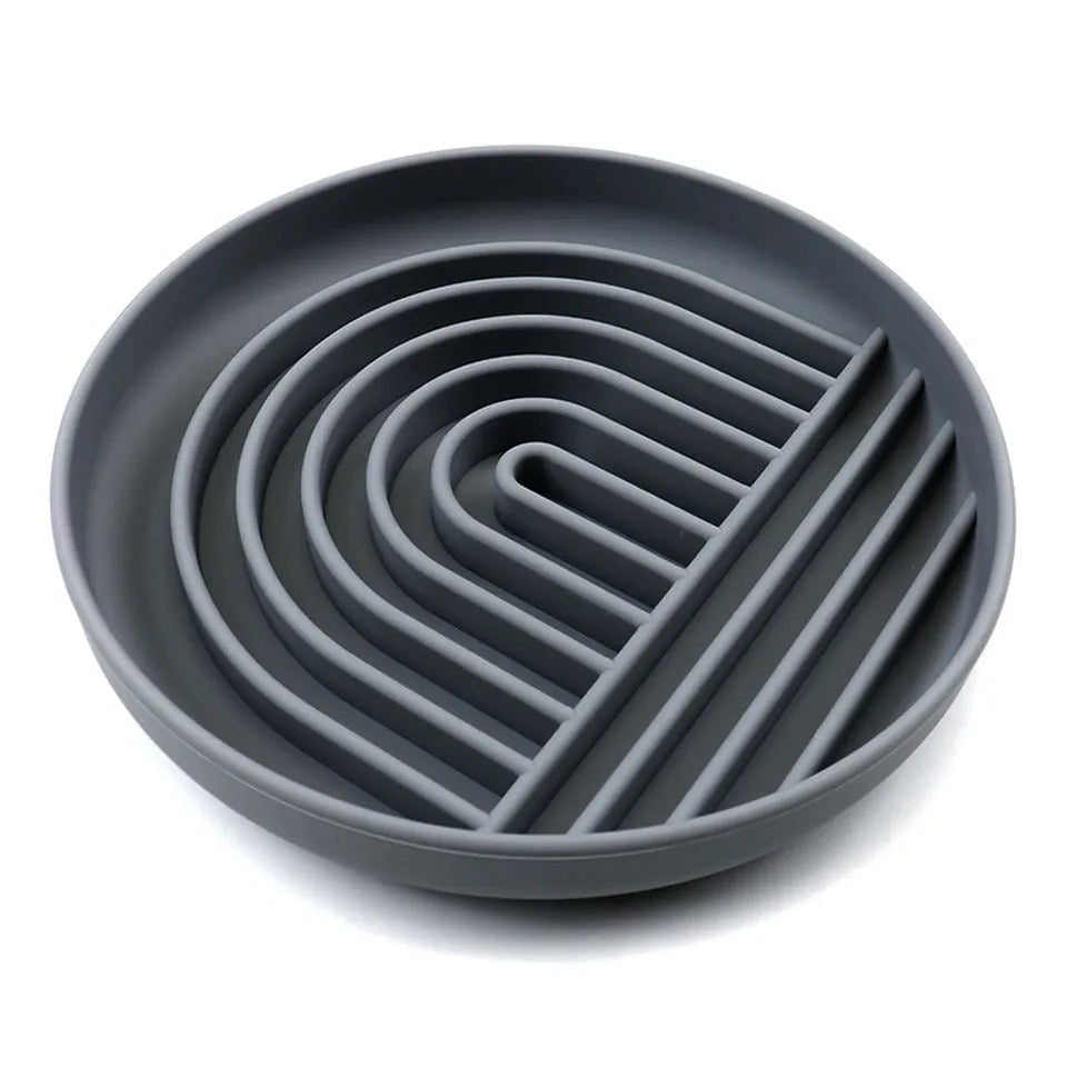 Silicone dog slow feeder bowl with ridges, shown in mustard green colour