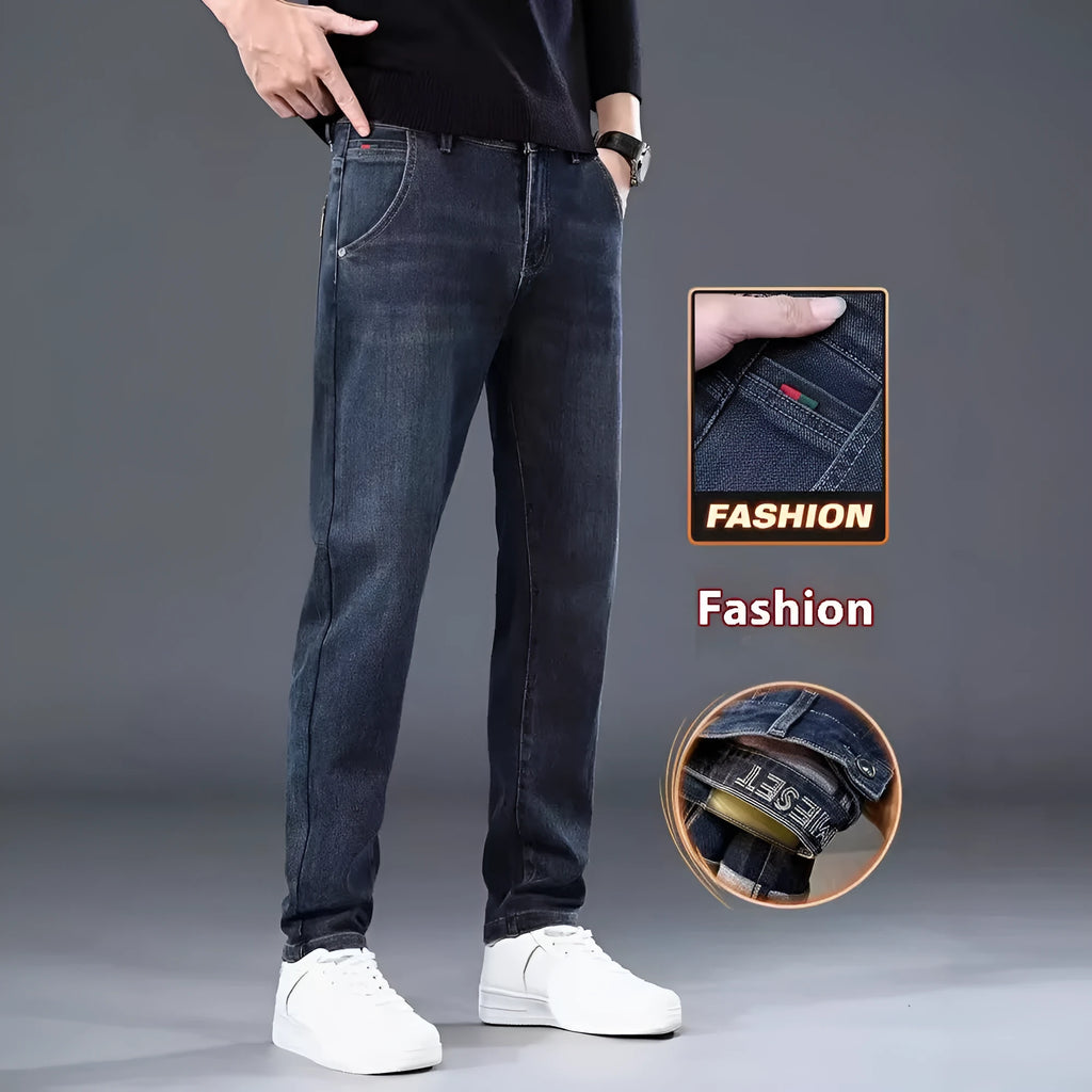 Blue gray slim straight casual men's trousers on a hanger, showing mid-waist fit and zipper fly.