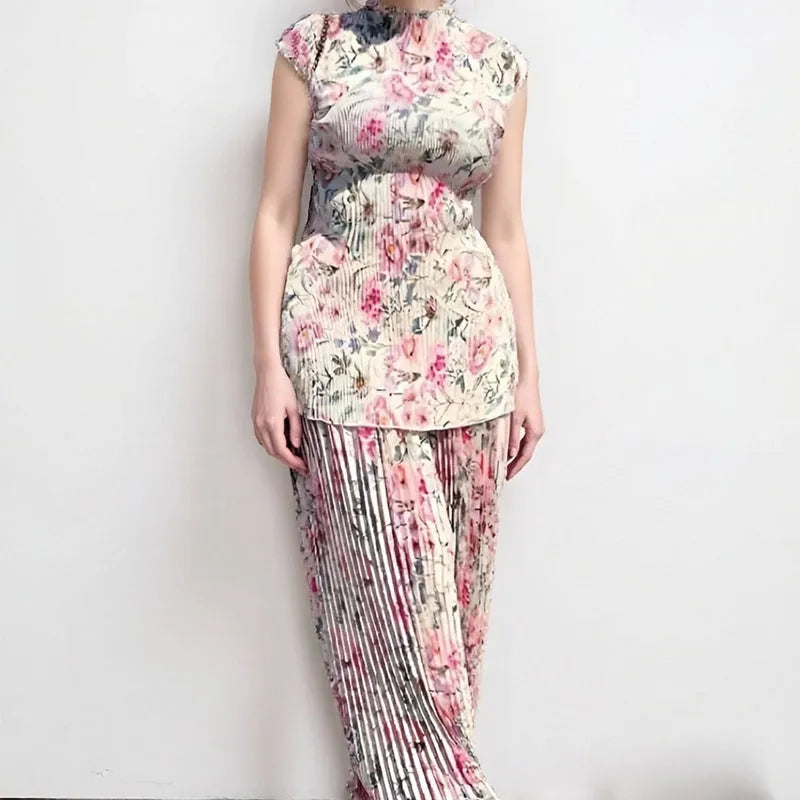 Long sleeve printed chiffon dress and top set on a hanger, showing high waist design.