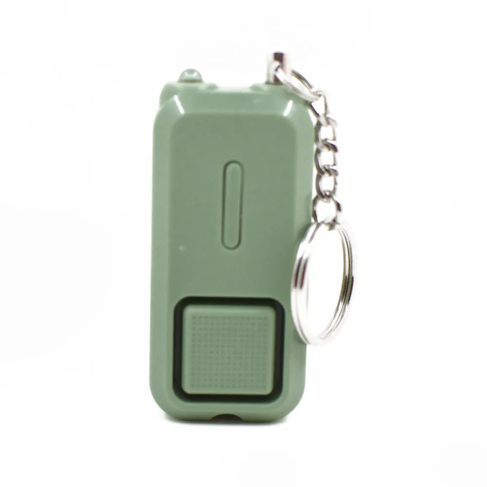 Compact personal safety alarm device in multiple colours showing 65x30x12mm dimensions