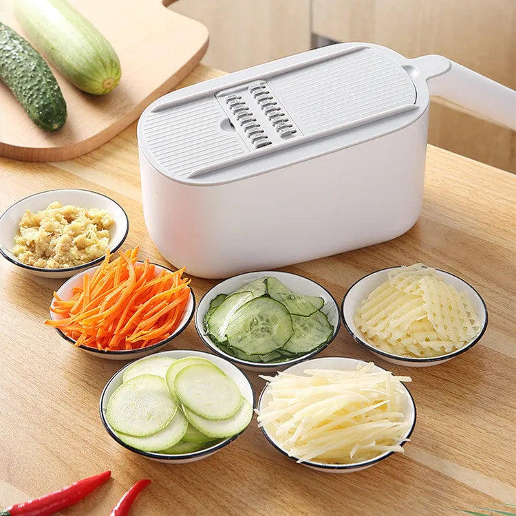 Multifunctional vegetable cutter in Nordic style with stainless steel blades, available in blue, grey, and khaki colours